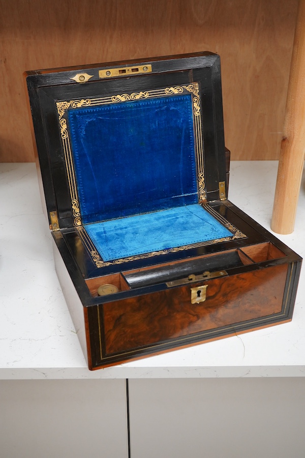 An early Victorian rosewood mother of pearl inlaid work box and burr walnut with slope